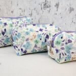 SET OF THREE COSMETIC BAG/POUCHES WITH WATERPROOF LINING